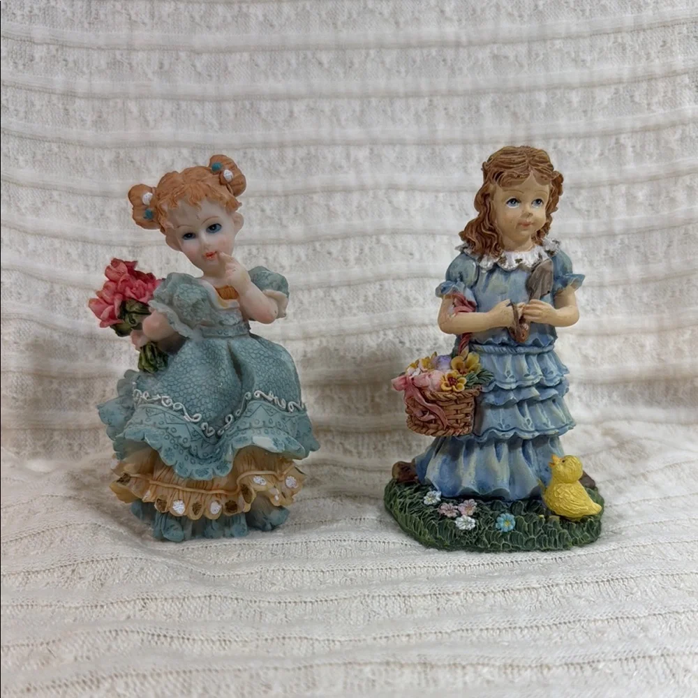 Charming Figurine Set with Blue and Pink Accents